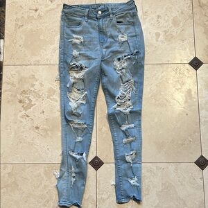 American Eagle Outfitters Ripped Light Blue Ankle Jeans